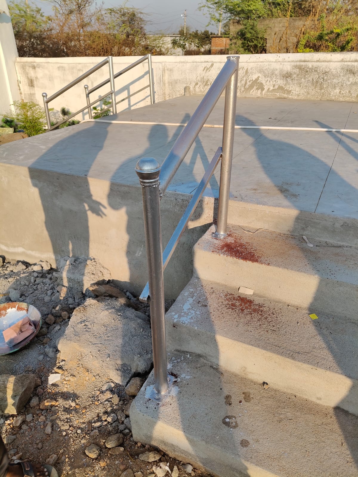 Stainless steel railing installation at Gudipally church
